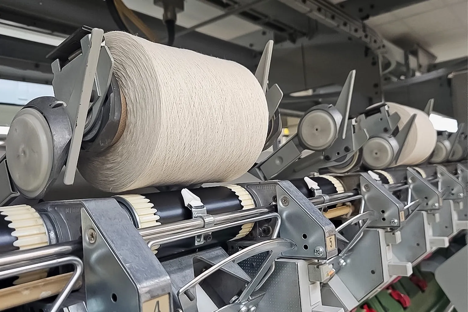 Yarn on the creel of a warping mill at Renaissance Fiber